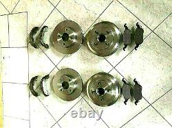 Ford Fiesta 02-08 Two Brake Drums Fitted Bearings 2 Front Discs Pads Rear Shoes